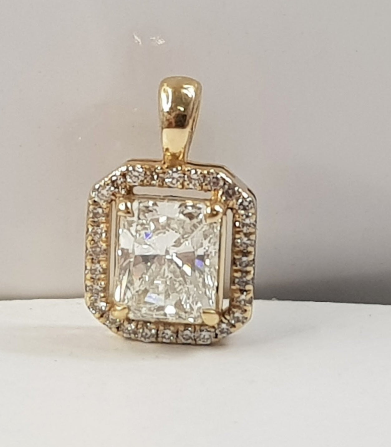 Ciondolo in oro 18k e diamanti naturali princess certificato IGI 1.36ct