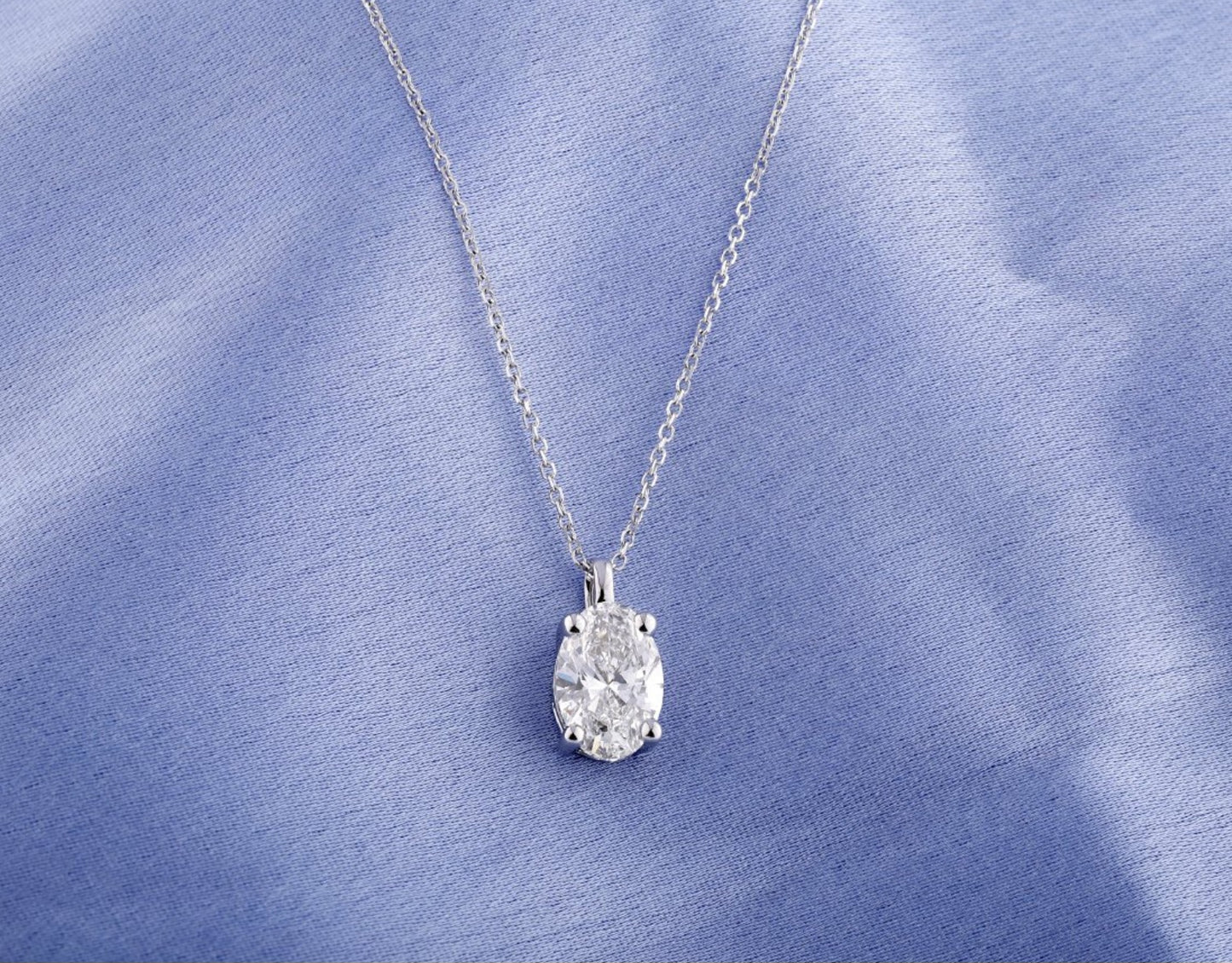Collana punto luce in oro e diamante naturale ovale 0.50ct