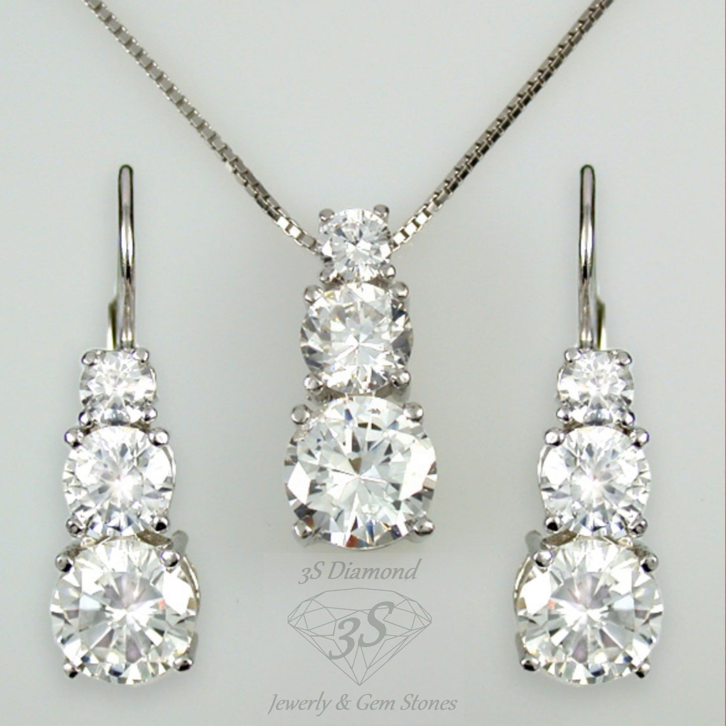 set completo trilogy ciondolo e orecchini punto luce in oro bianco 18k 750 e 9 diamanti naturali 2,10 ct E F