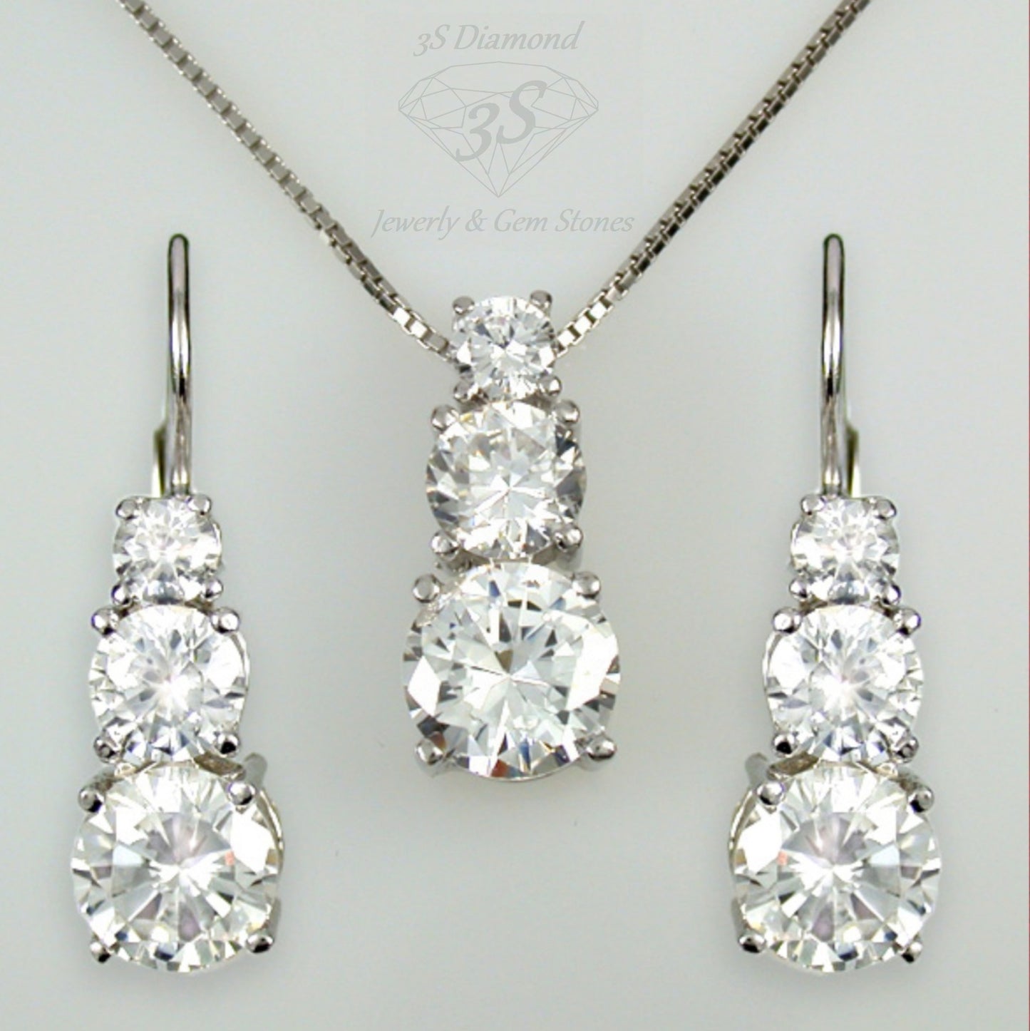 set completo trilogy  ciondolo e orecchini  oro 18k 750 e diamanti naturali 2,70 ct color E VVS1
