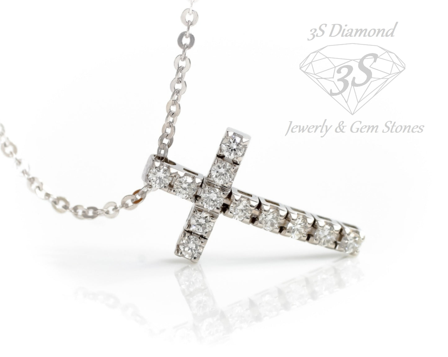 ciondolo croce in oro bianco 18k e 11 diamanti naturali 1,10 ct
