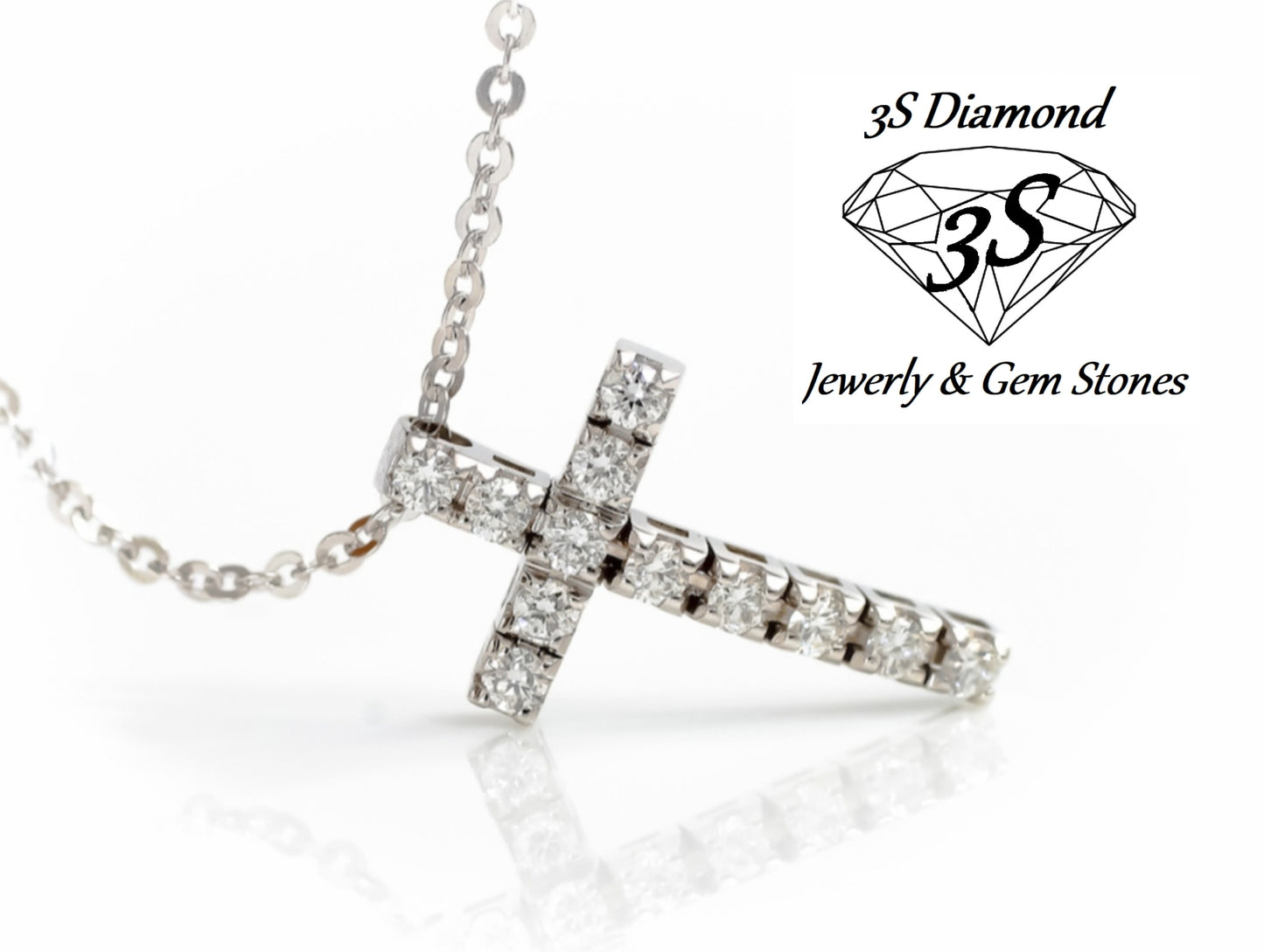 ciondolo croce in oro bianco 18k e 11 diamanti naturali 1,10 ct