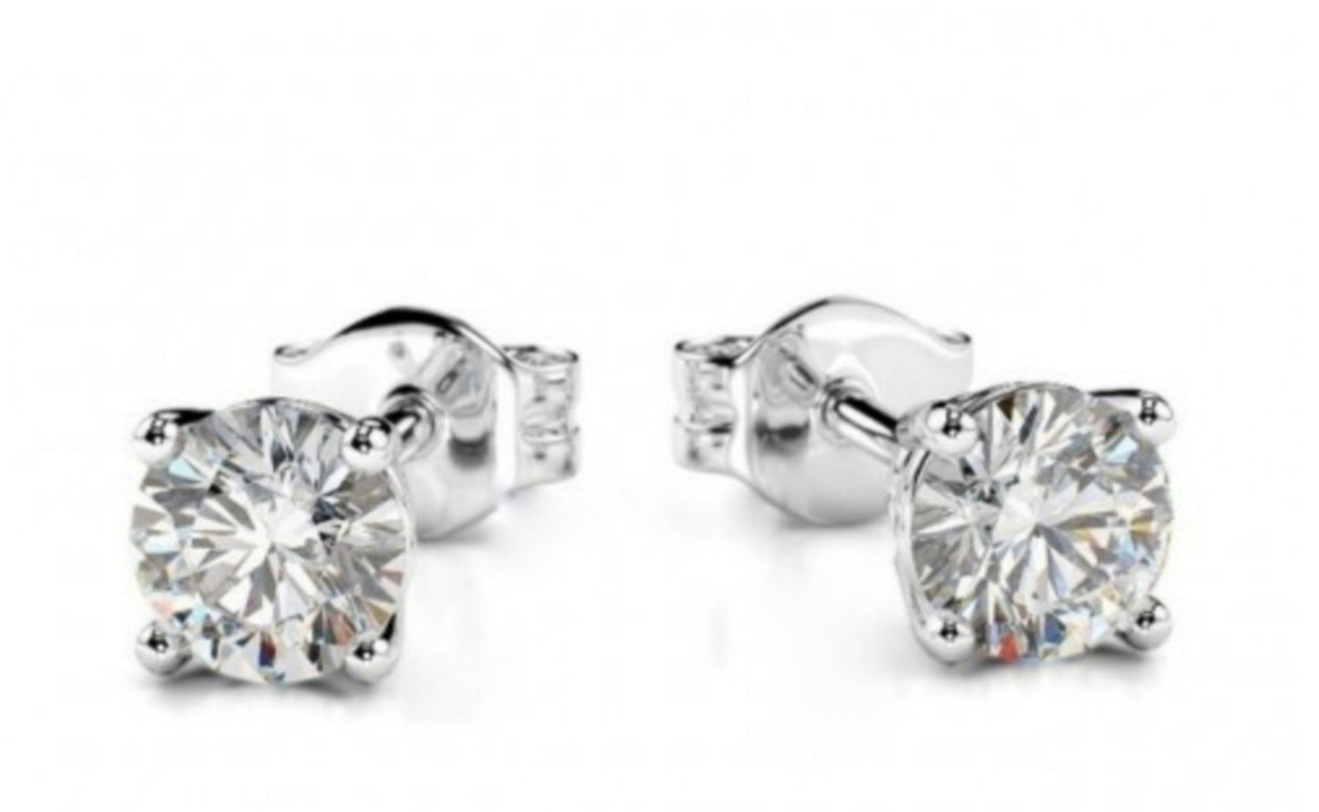 orecchini punto luce in oro bianco 18k e 2 diamanti naturali 0,20ct