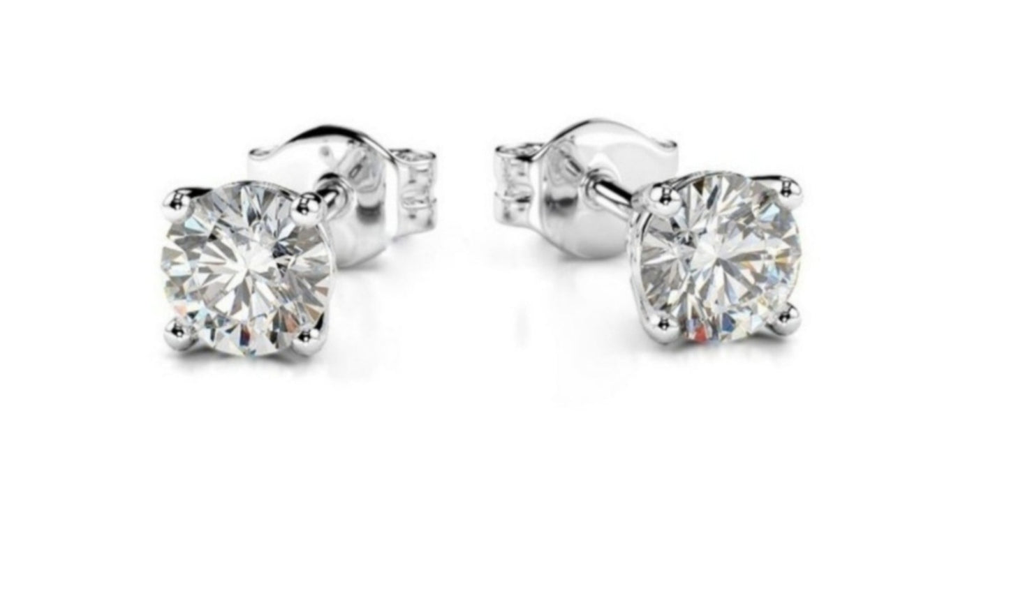 orecchini punto luce in oro bianco 18k e 2 diamanti naturali 0,20ct